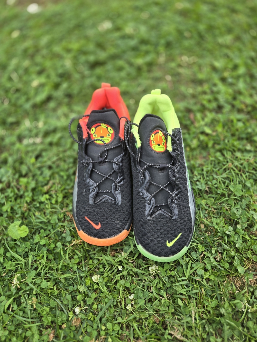 Kids Black Athletic Sneakers with Neon Orange and Neon Green Accents